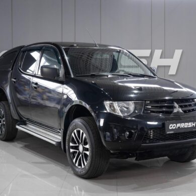 Mitsubishi L200 2.5d MT (136 л.с.) 4WD 2012 (Пикап)