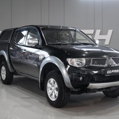 Mitsubishi L200 2.5d MT (136 л.с.) 4WD 2012 (Пикап)